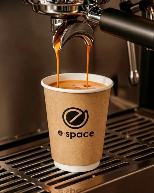 Espresso pouring into an E-Space Coffee & Craft Beer cup